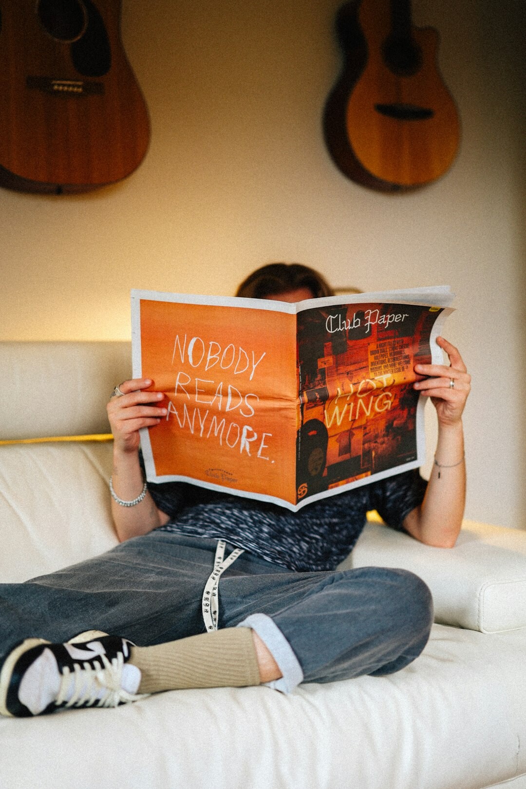 man reading crime novel